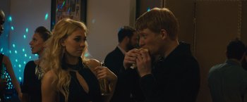 Movie still from “About Time” (2013), directed by Richard Curtis – A man and a woman are eating a sandwich; Medium shot, Over the shoulder angle