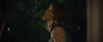 Movie still from “About Time” (2013), directed by Richard Curtis – A young woman is looking up at the sky; Close Up shot, Low angle
