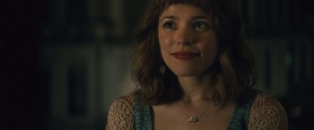 Movie still from “About Time” (2013), directed by Richard Curtis – A person wearing a necklace; Close Up shot, Over the shoulder angle