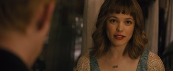 Movie still from “About Time” (2013), directed by Richard Curtis – A person wearing a necklace; Close Up shot, Over the shoulder angle