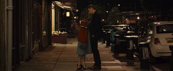 Movie still from “About Time” (2013), directed by Richard Curtis – A man and a woman standing on a sidewalk; Medium shot, Over the shoulder angle
