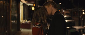 Movie still from “About Time” (2013), directed by Richard Curtis – A man and a woman kissing each other in the dark; Close Up shot, Over the shoulder angle