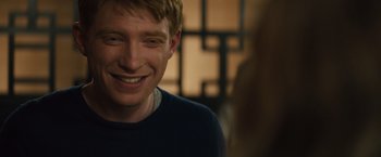 Movie still from “About Time” (2013), directed by Richard Curtis – A person smiling; Close Up shot, Over the shoulder angle