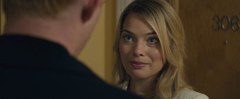 Movie still from “About Time” (2013), directed by Richard Curtis – A woman looking at a man in the mirror; Close Up shot, Over the shoulder angle