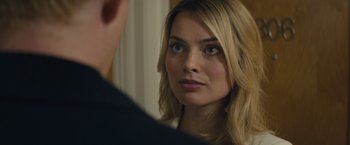 Movie still from “About Time” (2013), directed by Richard Curtis – A woman looking at a man in the mirror; Close Up shot, Over the shoulder angle