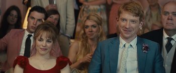 Movie still from “About Time” (2013), directed by Richard Curtis – A group of people sitting in a room; Close Up shot, Over the shoulder angle