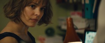 Movie still from “About Time” (2013), directed by Richard Curtis – A person with short brown hair; Close Up shot, Over the shoulder angle