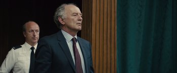 Movie still from “About Time” (2013), directed by Richard Curtis – An older man wearing a suit and tie; Close Up shot, Over the shoulder angle