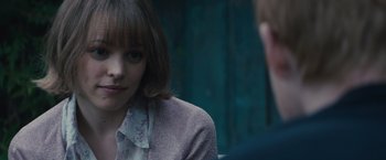 Movie still from “About Time” (2013), directed by Richard Curtis – A woman sitting in front of another man; Close Up shot, Over the shoulder angle
