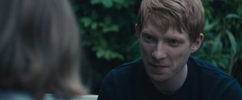 Movie still from “About Time” (2013), directed by Richard Curtis – A person sitting on a chair; Close Up shot, Over the shoulder angle