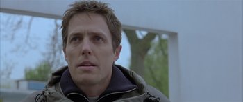 Movie still from “About a Boy” (2002), directed by Chris Weitz – A person wearing a jacket; Close Up shot, Low angle