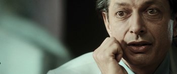 Movie still from “Adam Resurrected” (2008), directed by Paul Schrader – A man with his hand under his chin; Close Up shot, Low angle