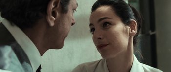 Movie still from “Adam Resurrected” (2008), directed by Paul Schrader – A man and a woman face to face in front of a white wall; Close Up shot, Over the shoulder angle