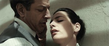 Movie still from “Adam Resurrected” (2008), directed by Paul Schrader – A man and a woman face to face in a dark room; Close Up shot, Low angle