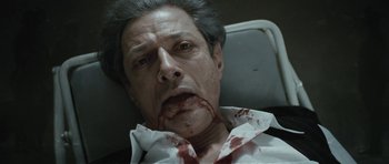 Movie still from “Adam Resurrected” (2008), directed by Paul Schrader – A person with blood all over his face; Close Up shot, Overhead angle