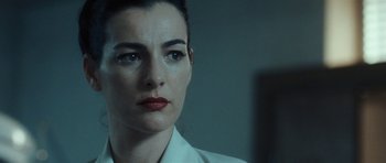 Movie still from “Adam Resurrected” (2008), directed by Paul Schrader – A person wearing a white shirt; Close Up shot, Low angle