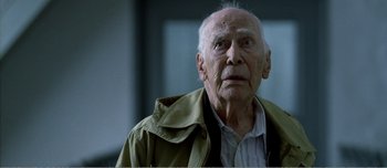 Movie still from “Adam's Apples” (2005), directed by Anders Thomas Jensen – An old man looking up at the sky; Close Up shot, Low angle