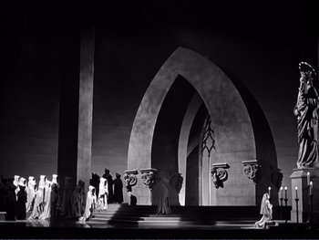 Movie still from “Address Unknown” (1944), directed by William Cameron Menzies – A black - and - white photo of a stage set; Extreme Wide shot, Low angle