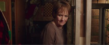 Movie still from “Adult Life Skills” (2016), directed by Rachel Tunnard – A person with short hair; Close Up shot, Over the shoulder angle