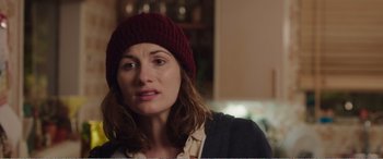 Movie still from “Adult Life Skills” (2016), directed by Rachel Tunnard – A person wearing a hat; Close Up shot, Over the shoulder angle