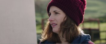 Movie still from “Adult Life Skills” (2016), directed by Rachel Tunnard – A person wearing a hat; Close Up shot, Over the shoulder angle