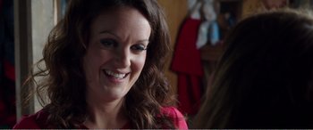 Movie still from “Adult Life Skills” (2016), directed by Rachel Tunnard – A person with long brown hair; Close Up shot, Over the shoulder angle