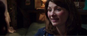 Movie still from “Adult Life Skills” (2016), directed by Rachel Tunnard – A person with long brown hair; Close Up shot, Over the shoulder angle