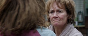 Movie still from “Adult Life Skills” (2016), directed by Rachel Tunnard – An older woman looking at a younger woman; Close Up shot, Over the shoulder angle