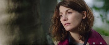 Movie still from “Adult Life Skills” (2016), directed by Rachel Tunnard – A person with long brown hair; Close Up shot, Over the shoulder angle