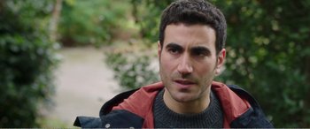 Movie still from “Adult Life Skills” (2016), directed by Rachel Tunnard – A person wearing a jacket; Close Up shot, Over the shoulder angle