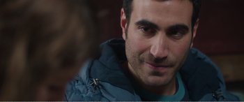 Movie still from “Adult Life Skills” (2016), directed by Rachel Tunnard – A person wearing a jacket; Close Up shot, Over the shoulder angle