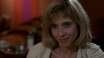 Movie still from “After Hours” (1985), directed by Martin Scorsese – A person with short blonde hair; Close Up shot, Over the shoulder angle