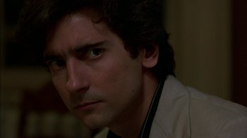 Movie still from “After Hours” (1985), directed by Martin Scorsese – A person wearing a jacket; Close Up shot, Over the shoulder angle