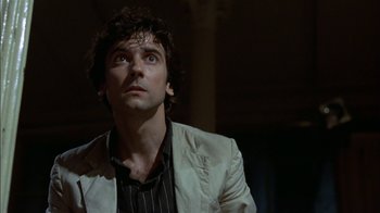 Movie still from “After Hours” (1985), directed by Martin Scorsese – A person wearing a jacket; Close Up shot, Low angle