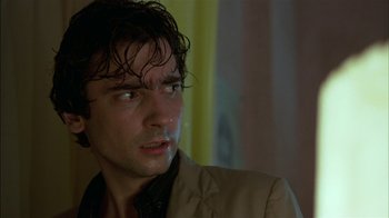 Movie still from “After Hours” (1985), directed by Martin Scorsese – A person with wet hair; Close Up shot, Low angle