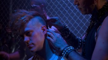 Movie still from “After Hours” (1985), directed by Martin Scorsese – A man getting his head shaved by a barber; Close Up shot, Over the shoulder angle