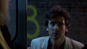 Movie still from “After Hours” (1985), directed by Martin Scorsese – A person holding a stick; Close Up shot, Low angle