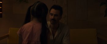 Movie still from “After Yang” (2021), directed by Kogonada – A man and a woman are talking to each other in a room; Close Up shot, Over the shoulder angle