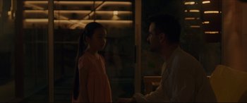 Movie still from “After Yang” (2021), directed by Kogonada – A man and a little girl talking to each other; Medium shot, Over the shoulder angle