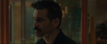 Movie still from “After Yang” (2021), directed by Kogonada – A person wearing a black shirt; Close Up shot, Over the shoulder angle