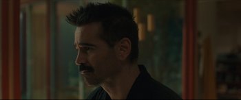 Movie still from “After Yang” (2021), directed by Kogonada – A person wearing a black shirt; Close Up shot, Over the shoulder angle