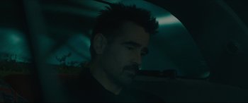 Movie still from “After Yang” (2021), directed by Kogonada – A person in a car at night; Close Up shot, Over the shoulder angle