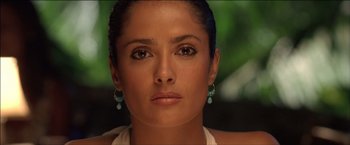 Movie still from “After the Sunset” (2004), directed by Brett Ratner – A person wearing a white shirt; Close Up shot, Low angle