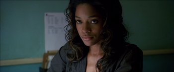 Movie still from “After the Sunset” (2004), directed by Brett Ratner – A person with long hair; Close Up shot, Over the shoulder angle