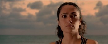 Movie still from “After the Sunset” (2004), directed by Brett Ratner – A person looking up at the sky; Close Up shot, Low angle