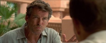 Movie still from “After the Sunset” (2004), directed by Brett Ratner – A person talking to another person; Close Up shot, Over the shoulder angle