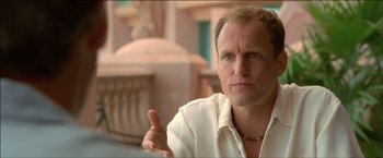 Movie still from “After the Sunset” (2004), directed by Brett Ratner – A person with a hand pointing at the camera; Close Up shot, Over the shoulder angle