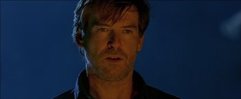 Movie still from “After the Sunset” (2004), directed by Brett Ratner – A person wearing a black shirt; Close Up shot, Low angle