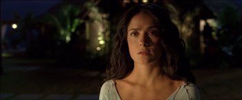 Movie still from “After the Sunset” (2004), directed by Brett Ratner – A person with long black hair; Close Up shot, Low angle