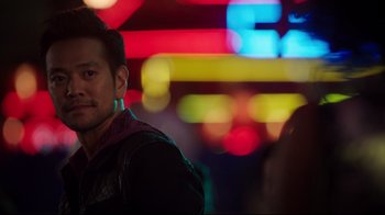 Movie still from “Agents of S.H.I.E.L.D.” (2013), created by Joss Whedon – A person wearing a leather jacket; Close Up shot, Over the shoulder angle